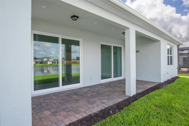 view of patio / terrace featuring a water view