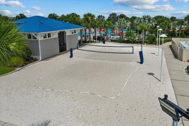 view of property's community featuring volleyball court