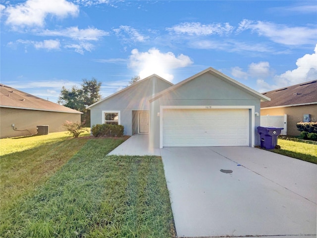 ranch-style house with a front lawn and a garage