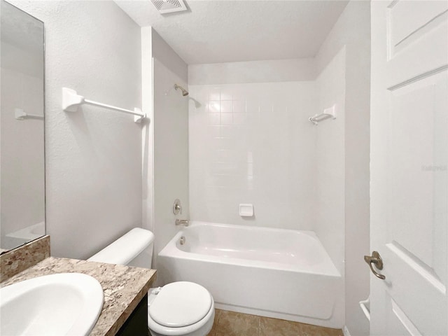 bathroom with visible vents, toilet, bathtub / shower combination, a textured ceiling, and vanity