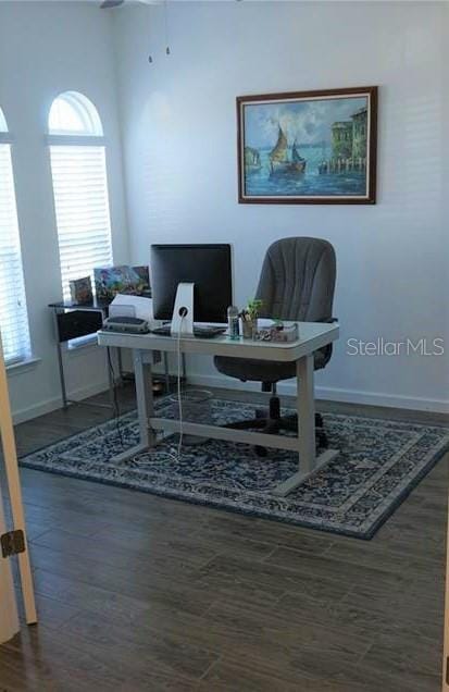 office space with hardwood / wood-style flooring