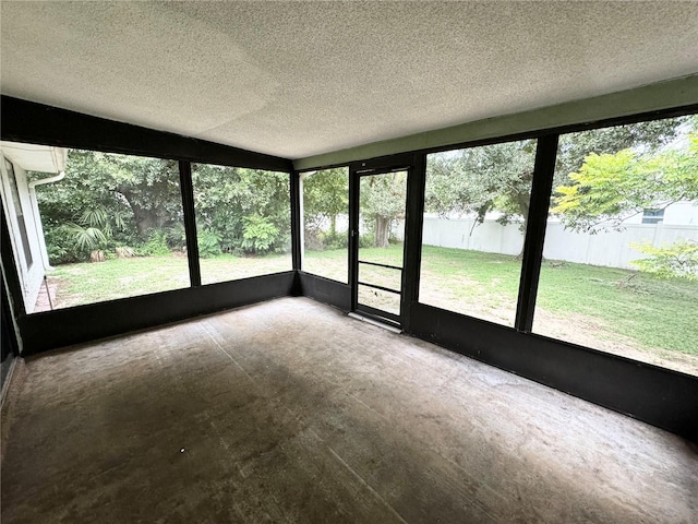 unfurnished sunroom featuring a wealth of natural light