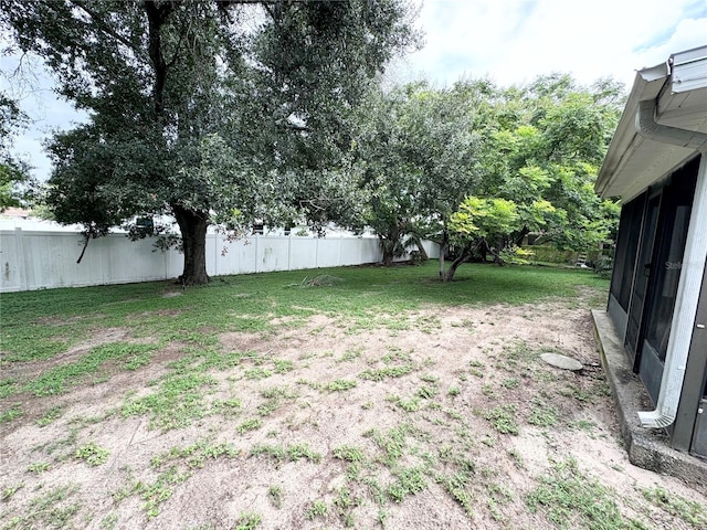 view of yard with fence