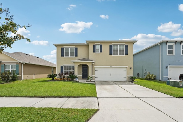 view of front property with a garage and a front lawn