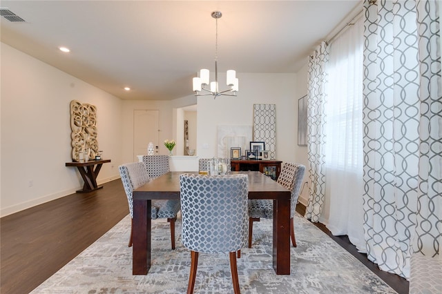 14007 Creek Harbor Dr, Orlando, FL 32824 - dining area featuring visible vents, dark wood-type flooring, a notable chandelier, recessed lighting, and baseboards