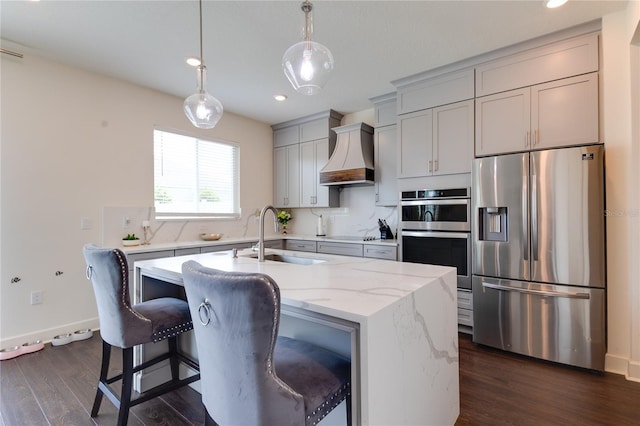 14007 Creek Harbor Dr, Orlando, FL 32824 - kitchen with a sink, premium range hood, gray cabinets, stainless steel appliances, and dark wood-style flooring