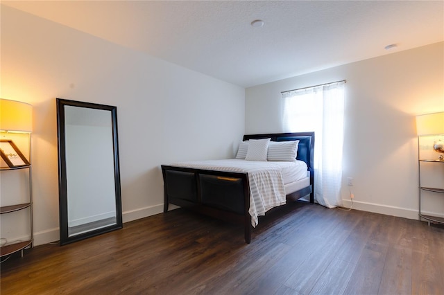 14007 Creek Harbor Dr, Orlando, FL 32824 - bedroom with dark wood-type flooring and baseboards