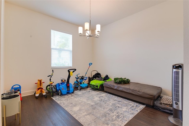 14007 Creek Harbor Dr, Orlando, FL 32824 - game room featuring baseboards, an inviting chandelier, and wood finished floors
