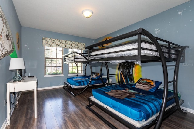 bedroom featuring hardwood / wood-style flooring