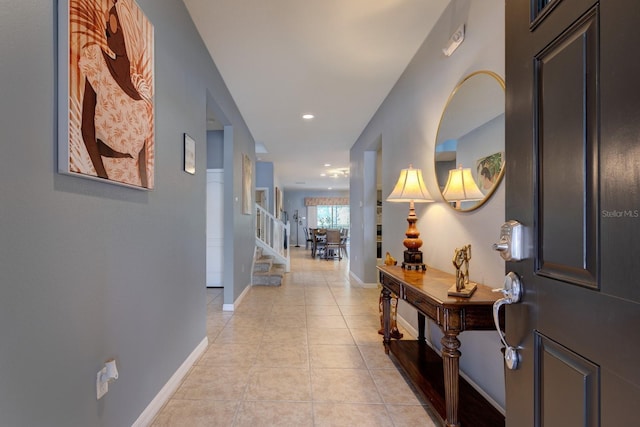 8804 Macapa Dr, Kissimmee, FL 34747 - hallway with light tile patterned floors, stairway, and recessed lighting