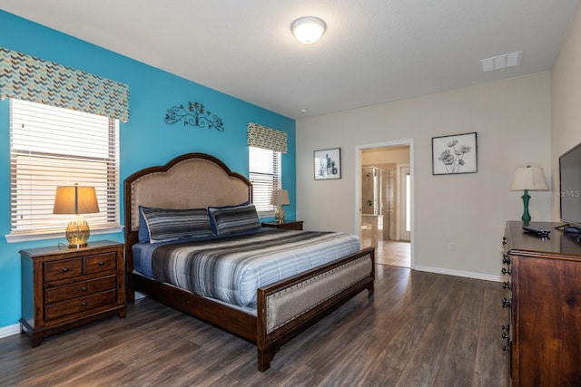 8804 Macapa Dr, Kissimmee, FL 34747 - bedroom with wood finished floors and connected bathroom