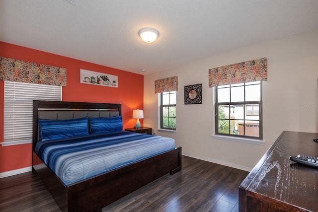 8804 Macapa Dr, Kissimmee, FL 34747 - bedroom featuring wood finished floors and baseboards