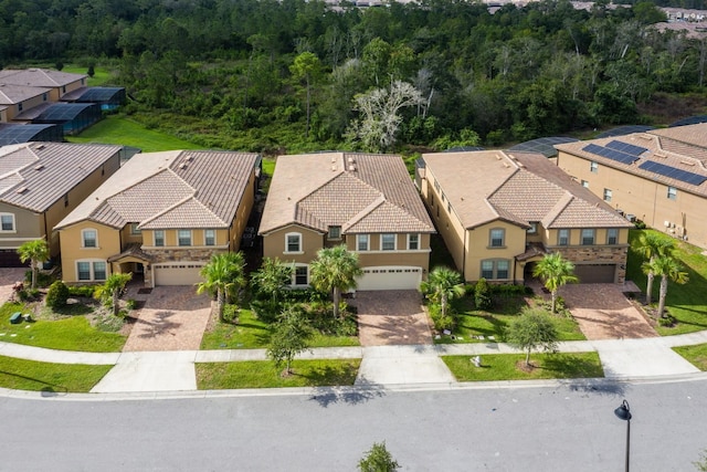 bird's eye view with a view of trees and a residential view