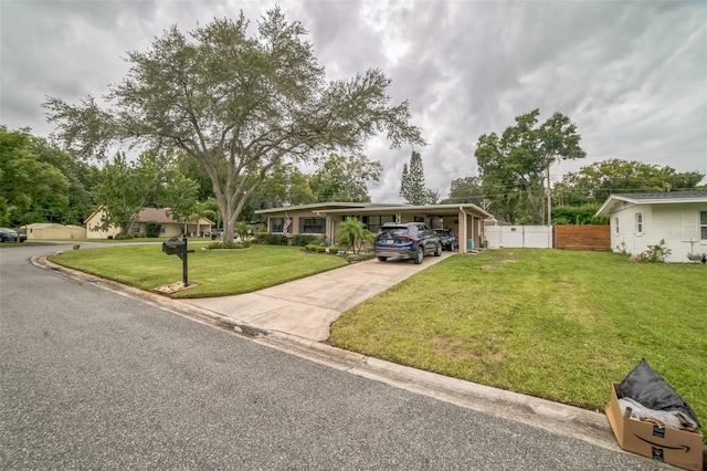 ranch-style home with a front yard