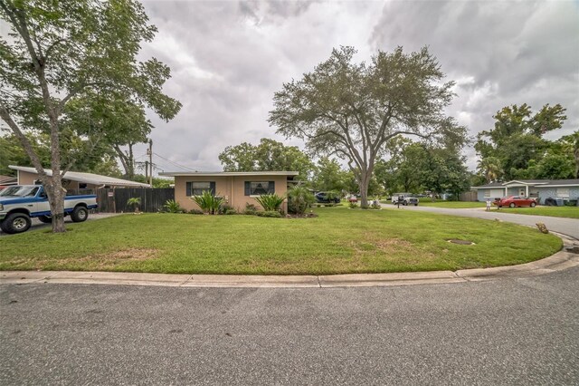 view of front of house with a front lawn