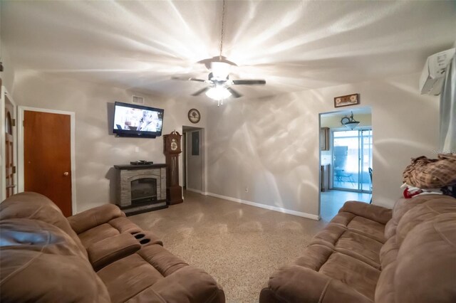 living room featuring a fireplace and ceiling fan