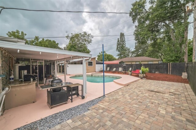 view of pool featuring a patio area