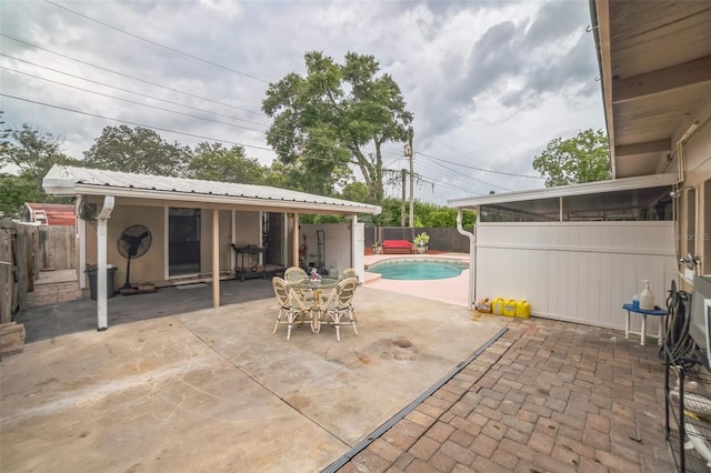 view of patio / terrace featuring a fenced in pool