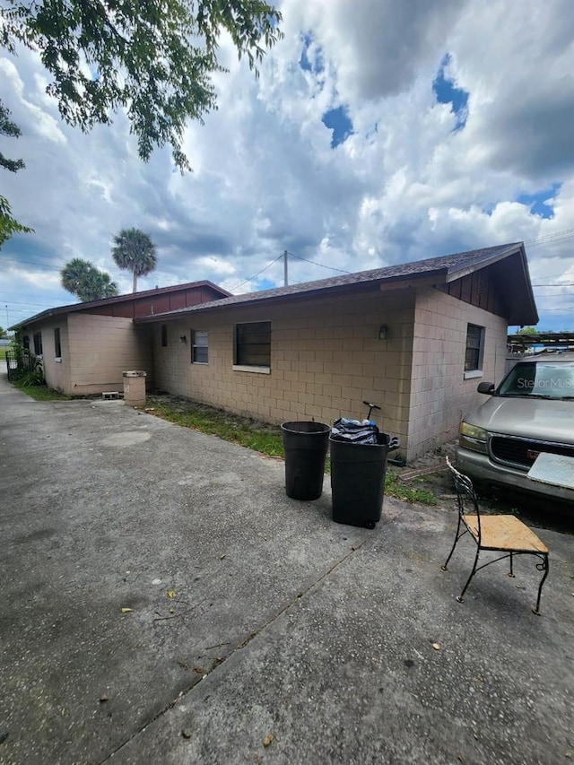 back of property with a patio area