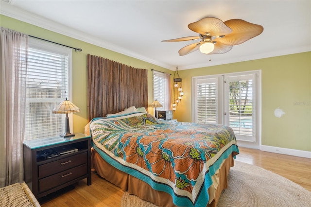 bedroom with light wood-type flooring, ceiling fan, access to exterior, and ornamental molding