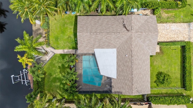 birds eye view of property featuring a water view