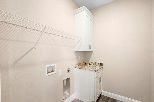 laundry area with washer hookup, dark hardwood / wood-style flooring, cabinets, and electric dryer hookup