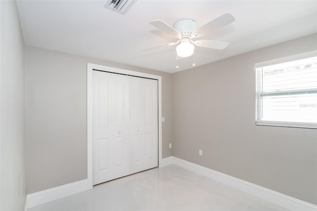 unfurnished bedroom with a closet and ceiling fan