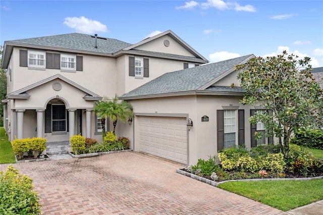 view of property with a garage