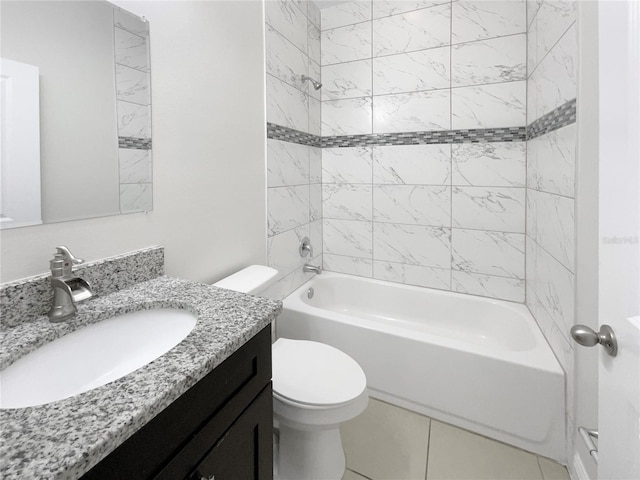 full bathroom featuring tile patterned flooring, vanity, toilet, and tiled shower / bath combo