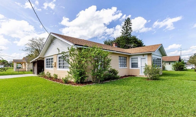 view of property exterior featuring a yard