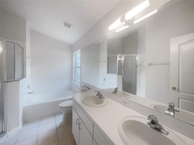 full bathroom with toilet, plus walk in shower, tile patterned floors, vanity, and vaulted ceiling