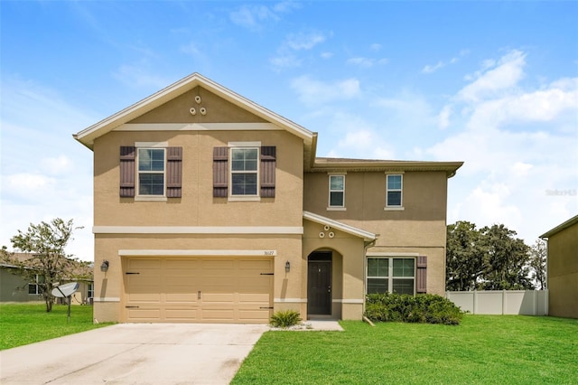 view of property featuring a garage and a front yard