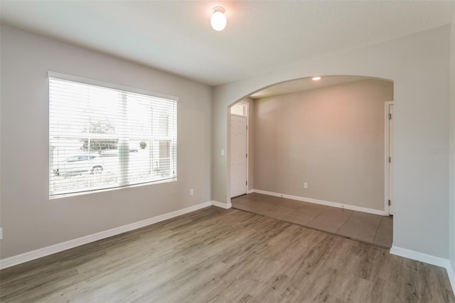 empty room featuring hardwood / wood-style flooring