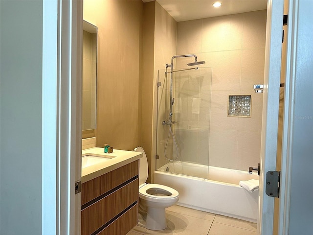 full bathroom with tub / shower combination, vanity, toilet, and tile patterned floors