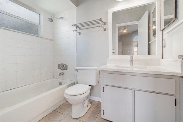 bathroom featuring  shower combination, plenty of natural light, tile patterned flooring, and toilet