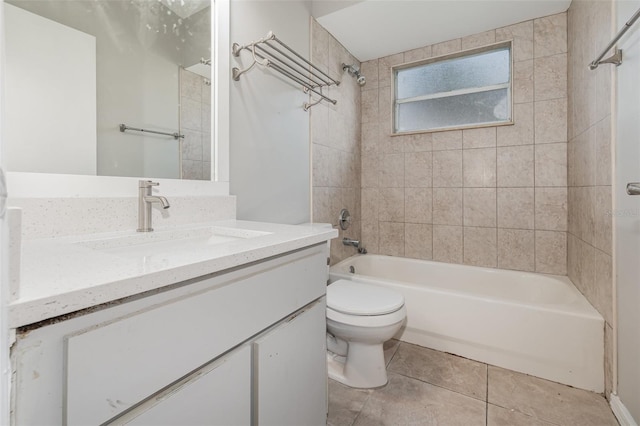 bathroom with  shower combination, tile patterned flooring, toilet, and vanity