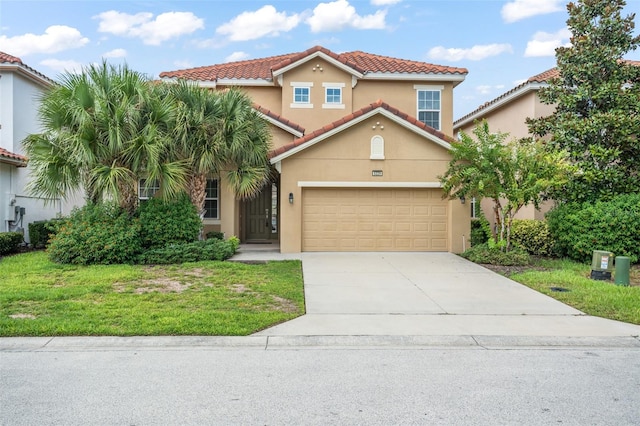 mediterranean / spanish-style home with a garage and a front lawn