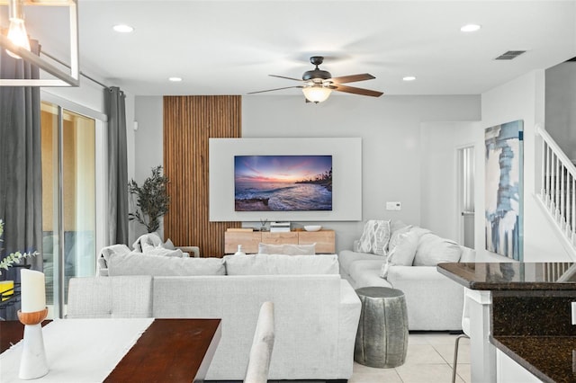 living room featuring recessed lighting, ceiling fan, visible vents, and light tile patterned flooring
