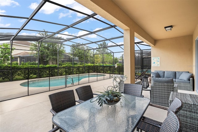 view of patio with a lanai, a fenced in pool, outdoor dining area, and an outdoor hangout area