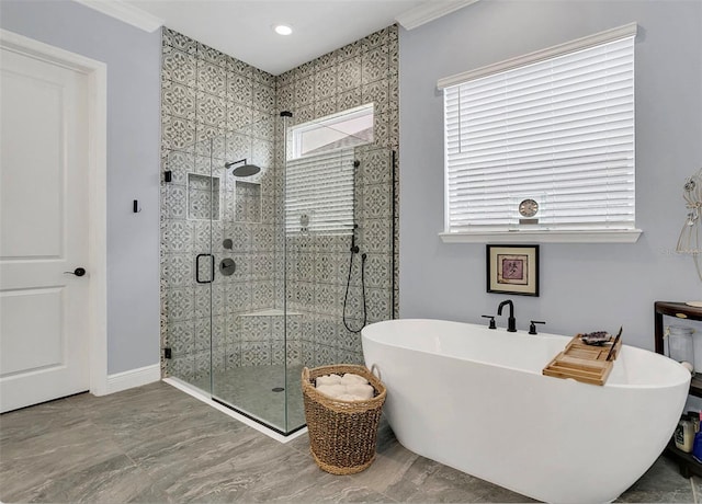 10472 Petrillo Way, Winter Garden, FL 34787 - full bathroom featuring a freestanding bath, a healthy amount of sunlight, a stall shower, and crown molding