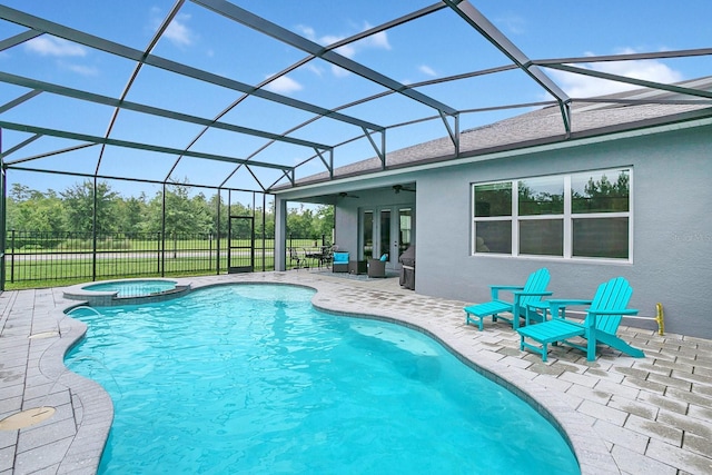 10472 Petrillo Way, Winter Garden, FL 34787 - view of swimming pool with glass enclosure, a ceiling fan, a pool with connected hot tub, french doors, and a patio area