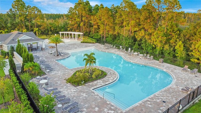 view of pool featuring a patio area