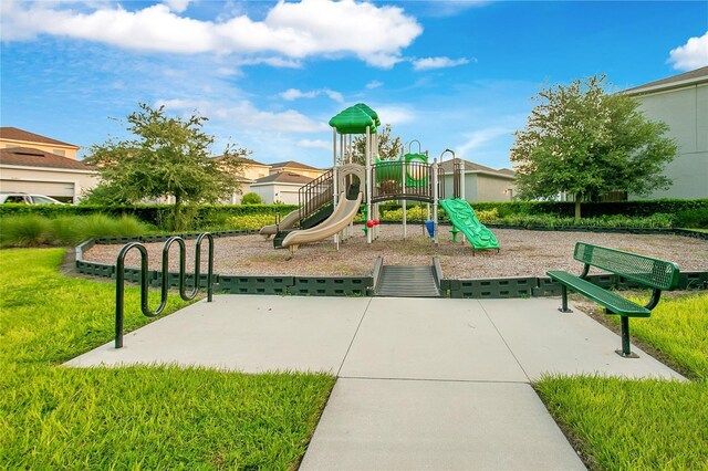 view of jungle gym with a yard