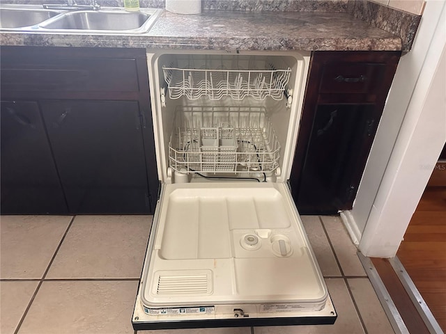 details with dishwasher, sink, and tile patterned flooring