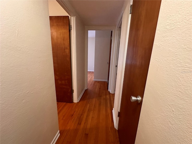 hall featuring hardwood / wood-style flooring