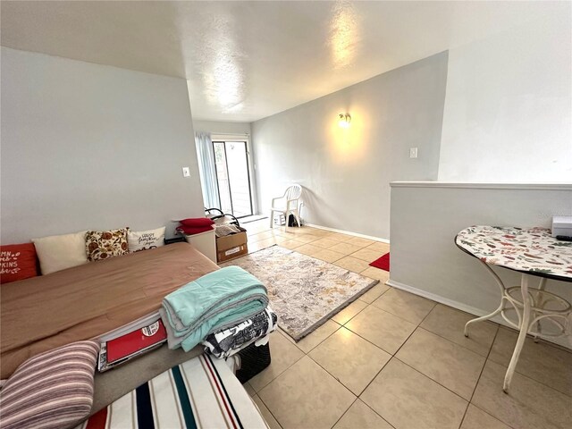 living room with light tile patterned floors