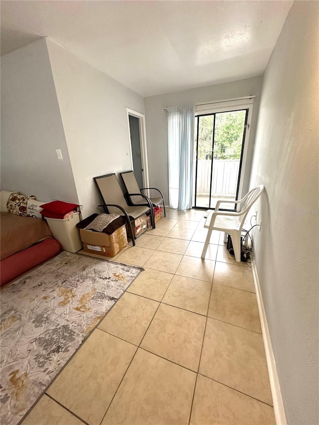 living room with light tile patterned floors