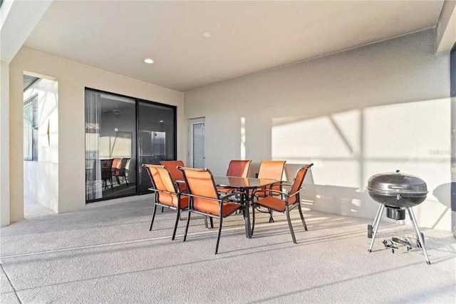 dining room featuring recessed lighting