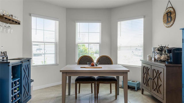 office space featuring light tile patterned flooring