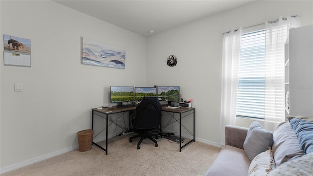 home office featuring light carpet and plenty of natural light